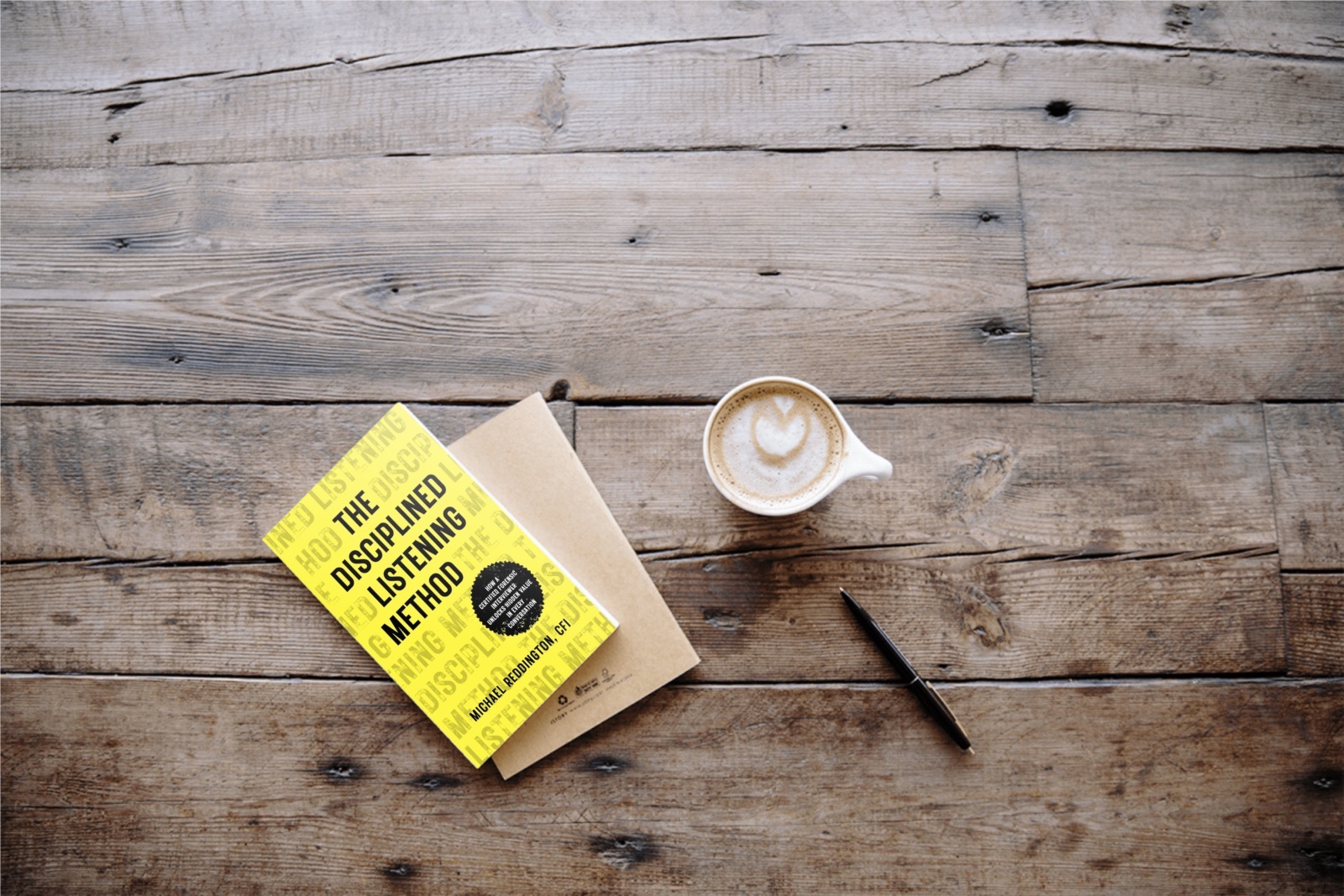 discipled listening book on rustic wooden table